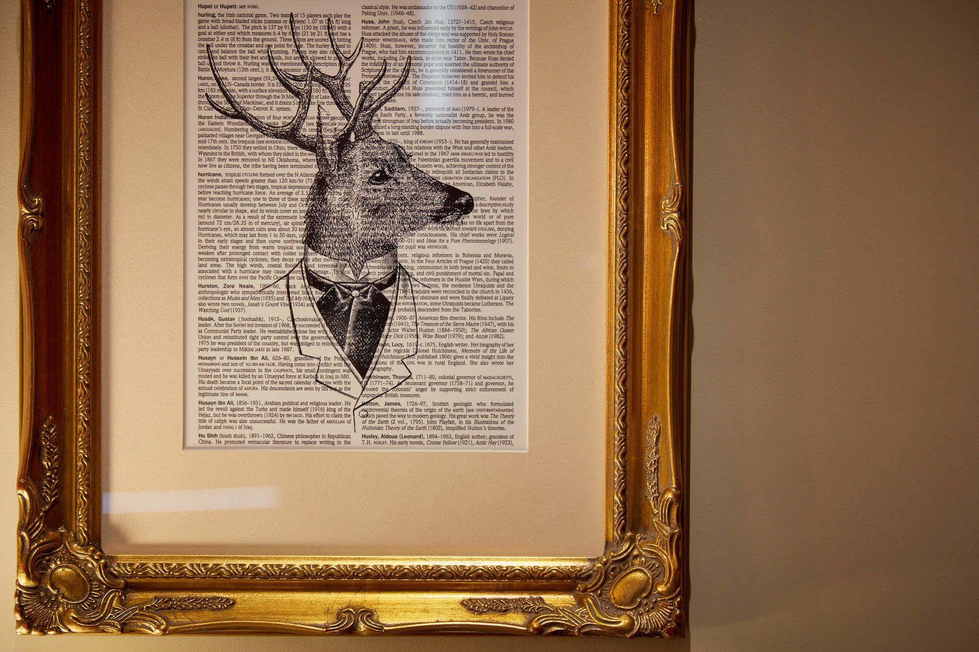 Oddfellows On The Park Cheadle  Exterior photo A framed print of a deer head with a bow tie